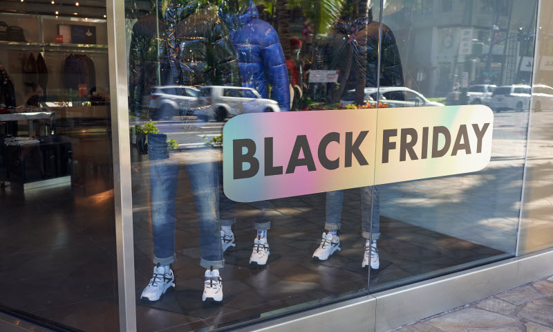 The Black Friday sign is seen at the storefront of a clothing retailer