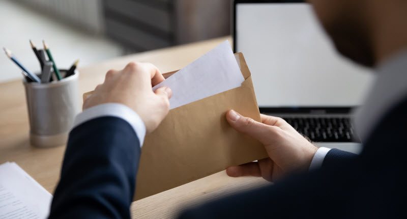 Acme Preston - Custom envelopes benefits Businessman opening envlope