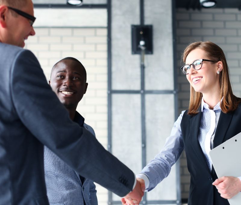Acme Preston - Specialist stationery Business people shaking hands